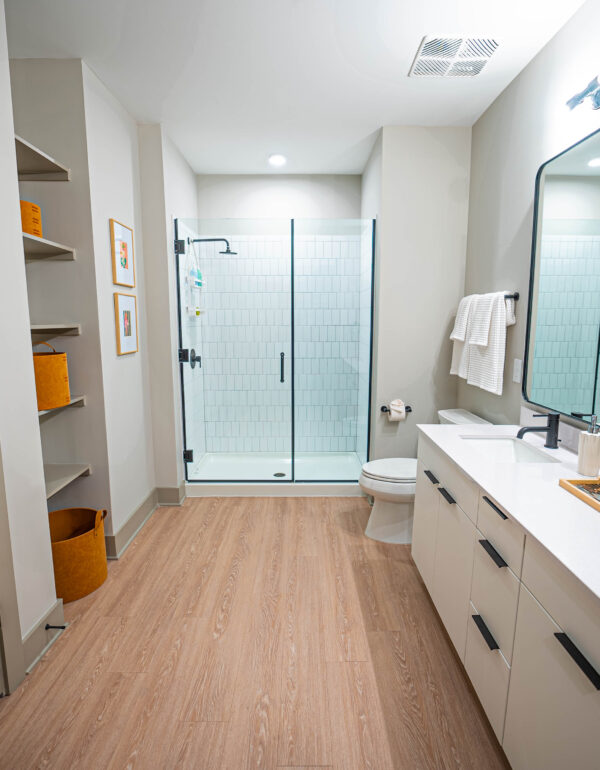 Wood look LVT in apartment unit bathroom
