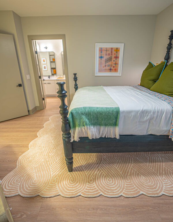 Wood look LVT in apartment unit bedroom